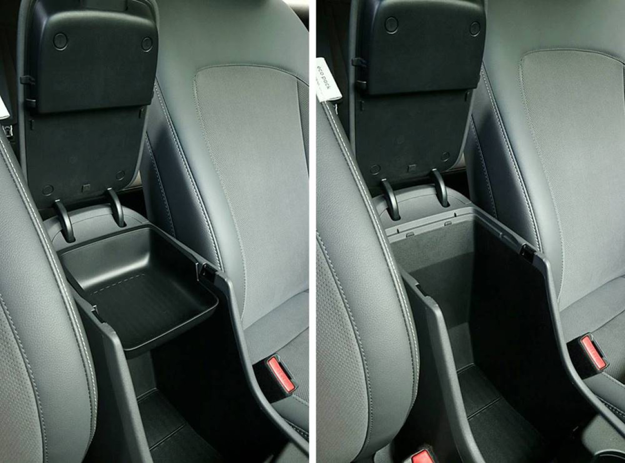 中央手枕箱採用開放式設計，方便提取物件。